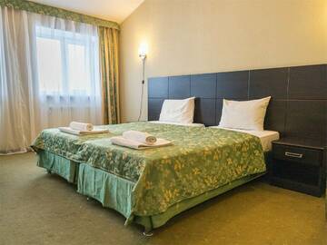 Улучшенный двухместный номер Делюкс с 1 кроватью или 2 отдельными кроватями в Гостинице Absolut